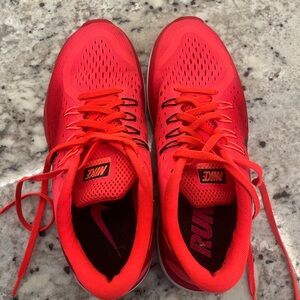 Hot pink Nike running shoes